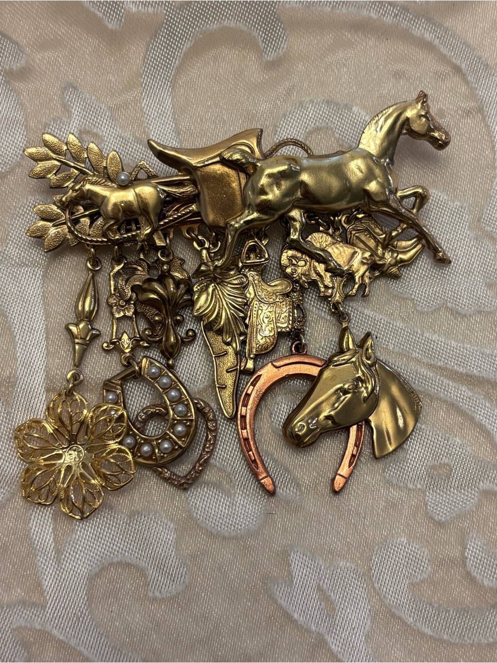 Gold-Tone Equestrian Charm Brooch with Mixed Dangles